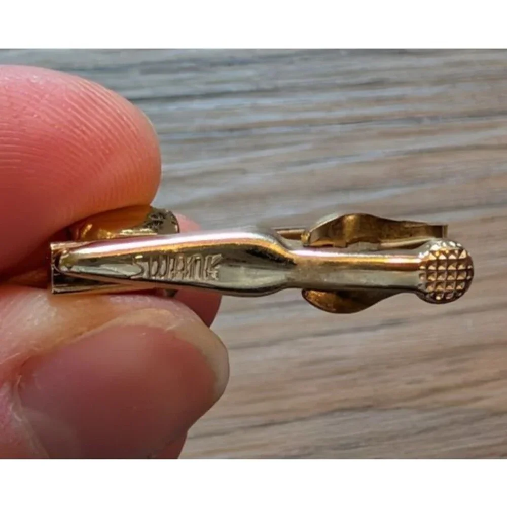 Vintage Swank Gold Tone Tie Bar/Clip with a Blue Rhinestone
